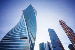 Modern Glass Skyscrapers Against The Blue Sky And Clouds, The Building Of The Business Center In Moscow Royalty Free Stock Image Modern Glass Skyscrapers Against The Blue Sky And Clouds, The Building Of The Business Center In Moscow Royalty Free Stock Image