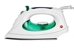Modern green steam flat-iron. Royalty Free Stock Image Modern green steam flat-iron. Royalty Free Stock Image