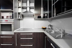 Modern Kitchen In Black And Wenge Colors Royalty Free Stock Photography