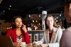 Modern ladies meeting in cafe royalty free stock photos Modern ladies meeting in cafe royalty free stock photos