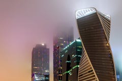 Modern office building night fog royalty free stock photos Modern office building night fog royalty free stock photos