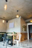 Modern pizzeria interior with gray plaster on the walls stock photo Modern pizzeria interior with gray plaster on the walls stock photo