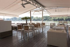 Modern riverside cafe interior in the morning royalty free stock photos Modern riverside cafe interior in the morning royalty free stock photos