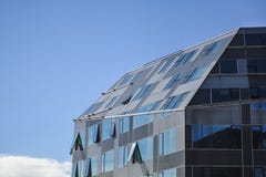 Modern and unusual architecture from metal and glass. Non-standard forms and decisions. Lines and geometry of the big building. royalty free stock photos Modern and unusual architecture from metal and glass. Non-standard forms and decisions. Lines and geometry of the big building. royalty free stock photos