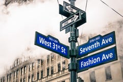 Modern urban street sign and vapor steam in New York City