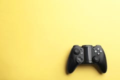 Modern video game controller on color background stock images Modern video game controller on color background stock images