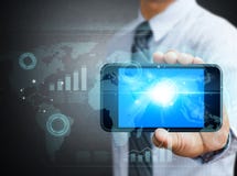 Moderner Technologiehandy in einer Hand lizenzfreies stockfoto Moderner Technologiehandy in einer Hand lizenzfreies stockfoto