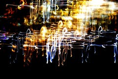 Modèle abstrait lumineux dans différentes lignes et taches d'une couleur sur un noir Photographie stock Modèle abstrait lumineux dans différentes lignes et taches d'une couleur sur un noir Photographie stock