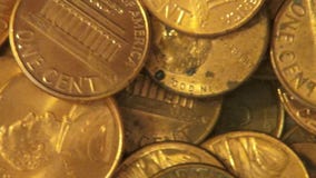 Moedas de um centavo, moedas, dinheiro, moeda video estoque Moedas de um centavo, moedas, dinheiro, moeda video estoque