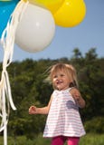 Mom girl plays with balloons royalty free stock images Mom girl plays with balloons royalty free stock images