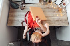 Mom and little son pack a gift royalty free stock photography Mom and little son pack a gift royalty free stock photography
