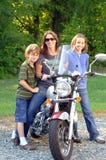 Mom with motorcycle and kids