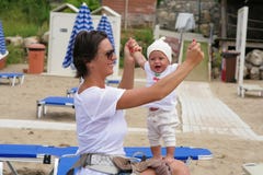 mom with a small daughter on the beach royalty free stock image mom with a small daughter on the beach royalty free stock image