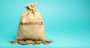 Money bag with the word Inheritance. Separation of inheritance between relatives or transfer of property to charitable