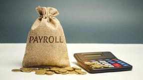 Money bag with the word Payroll and calculator. Payroll is the sum total of all compensation a business must pay to its employees stock image Money bag with the word Payroll and calculator. Payroll is the sum total of all compensation a business must pay to its employees stock image