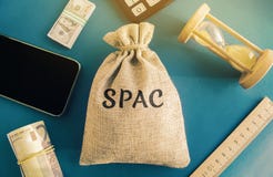 Money bag with the word SPAC - Special purpose acquisition company. Simplified listing of company, merger bypassing stock exchange