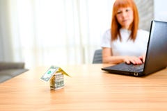 Happy woman using laptop. Concept of buying a home, real estate activity, meeting with advisor, new homes. royalty free stock photos Happy woman using laptop. Concept of buying a home, real estate activity, meeting with advisor, new homes. royalty free stock photos