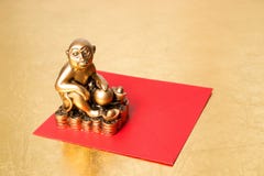 Monkey the symbol of the new year 2016 , and red envelope stock photography Monkey the symbol of the new year 2016 , and red envelope stock photography
