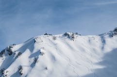 Montañas de la nieve de Krasnaya Polyana fotografía de archivo libre de regalías Montañas de la nieve de Krasnaya Polyana fotografía de archivo libre de regalías