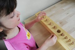 Montessori pussel. Förträning. arkivfoto Montessori pussel. Förträning. arkivfoto