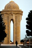 Monument in Baku, capital of Azerbaijan, to those killed on 20th January 1990, with a man silhouetted and looking at a grave Stock Image Monument in Baku, capital of Azerbaijan, to those killed on 20th January 1990, with a man silhouetted and looking at a grave Stock Image