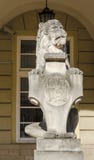 Monument of stone lion on a pedestal in Lviv royalty free stock photography Monument of stone lion on a pedestal in Lviv royalty free stock photography