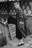 Mooi meisje in een plaid royalty-vrije stock fotografie Mooi meisje in een plaid royalty-vrije stock fotografie