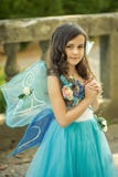 Mooi meisje in kleding met vleugels stock afbeeldingen Mooi meisje in kleding met vleugels stock afbeeldingen