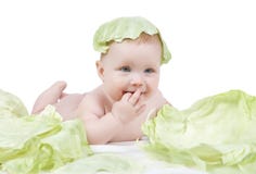 Mooi weinig baby op een witte achtergrond met groene kool stock afbeelding Mooi weinig baby op een witte achtergrond met groene kool stock afbeelding
