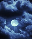 Moon beams and clouds