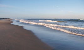 Morning Sun Shimmers off Ocean at Kitty Hawk royalty free stock images Morning Sun Shimmers off Ocean at Kitty Hawk royalty free stock images