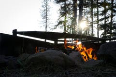 Morning sunrise through a campfire royalty free stock photo Morning sunrise through a campfire royalty free stock photo