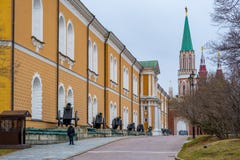 Moscow, Russia - April 10, 2022: People walking in Alexander Garden nearby Kremlin wall in Moscow, Russia