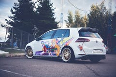 Moscow, Russia: July 06, 2019: Moscow, Russia: July 06, 2019: Bright white lowered volkswagen golf mk7 parked on street in sunny