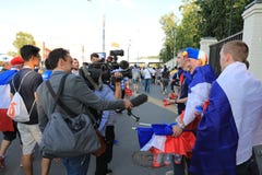 MOSCOW, RUSSIA - June 26, 2018: television interviews from French fans after the World Cup Group C game between France and Denmark royalty free stock photos MOSCOW, RUSSIA - June 26, 2018: television interviews from French fans after the World Cup Group C game between France and Denmark royalty free stock photos