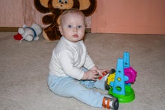 A little boy playing toys. Child at home. royalty free stock photography A little boy playing toys. Child at home. royalty free stock photography