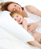 Mother An Baby In Bed Stock Photography