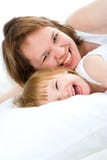 Mother An Baby In Bed Stock Photo
