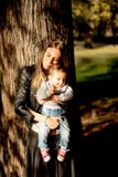 Mother and baby boy in autumn park royalty free stock photography Mother and baby boy in autumn park royalty free stock photography