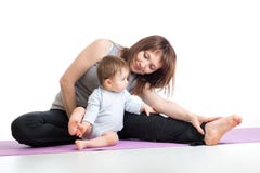 Mother with baby doing gymnastics and fitness exercises Stock Photo Mother with baby doing gymnastics and fitness exercises Stock Photo