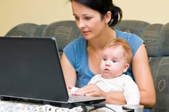 Mother, baby and laptop