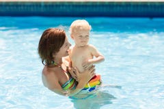 Mother and baby in swimming pool royalty free stock image Mother and baby in swimming pool royalty free stock image
