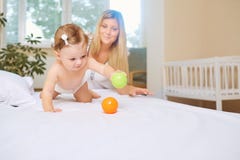 Mother and child are playing in the room. royalty free stock photography Mother and child are playing in the room. royalty free stock photography