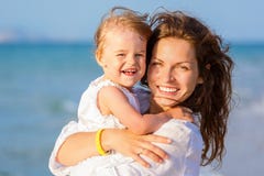 Mother and daughter on the beach Stock Photo Mother and daughter on the beach Stock Photo