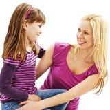 Mother and daughter smile at each other lovingly stock images Mother and daughter smile at each other lovingly stock images