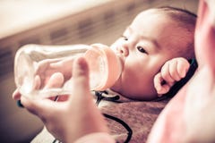 Mother Feeding Newborn Royalty Free Stock Photos Mother Feeding Newborn Royalty Free Stock Photos