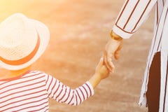 Mother holding a child`s hand stock images Mother holding a child`s hand stock images