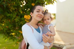 Mother hugging with her little daughter outdoor in nature on sunny day Positive human emotions, feelings, emotions royalty free stock photo Mother hugging with her little daughter outdoor in nature on sunny day Positive human emotions, feelings, emotions royalty free stock photo
