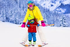 Mother and little boy learning to ski Royalty Free Stock Photo Mother and little boy learning to ski Royalty Free Stock Photo