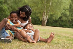 Mother Plays With Her Children Stock Photo
